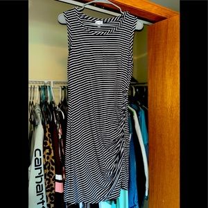 Blue and white striped dress, cinched on one side that is very flattering !